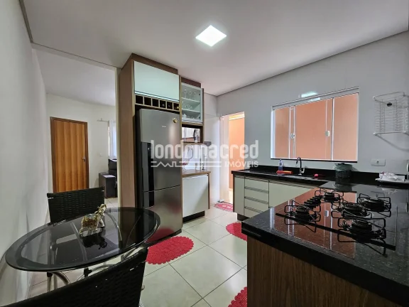 Imagem Casa à venda no Jardim São Paulo 2 – 2 quartos, cozinha planejada, área gourmet com churrasqueira e garagem coberta. Conforto e praticidade em Londrina!