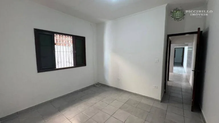 Imagem Casa com 3 dormitórios à venda, 71 m² por R$ 590.000 - Vila Guilhermina - Praia Grande/SP