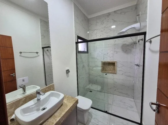 Imagem Imperdível oportunidade de adquirir casa de luxo em Votorantim-SP, no Alphaville Nova Esplanada 3, com 4 quartos, 3 suítes, 4 vagas de garagem e 204,10 m² de área.