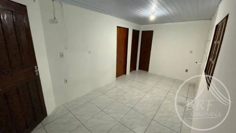 Imagem Vendo terreno com três casas e uma Kitnet em Serraria, São José SC