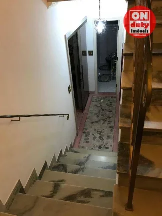 Imagem Sobrado à venda, 200 m² por R$ 1.950.000 - Ponta da Praia - Santos/SP