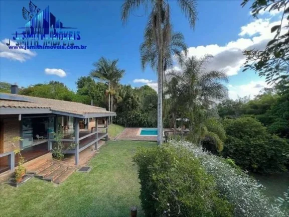 Imagem Casa LINDA TÉRREA! Impecável. Elementos rústicos! 3 suítes. Terreno 2.500m²