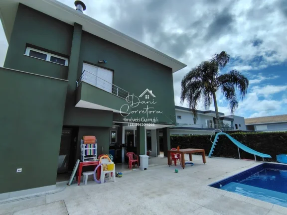 Imagem Casa de luxo em condomínio na Enseada, Guarujá-SP: 5 quartos, 5 suítes, 2 salas, 4 vagas e 390m² de área. Imperdível!