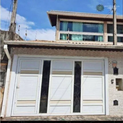 Imagem Sobrado com 3 dormitórios à venda, 180 m² por R$ 950.000,00 - Vila Guilhermina - Praia Grande/SP