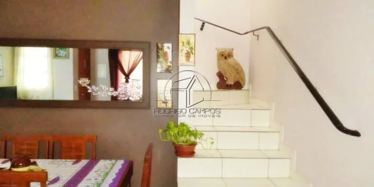 Imagem Casa Geminada à Venda em Tude Bastos, Praia Grande - 2 Quartos e Churrasqueira