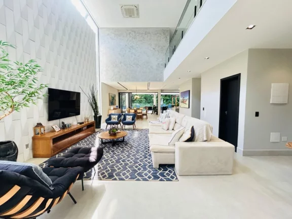Imagem Casa de Luxo à Venda na Riviera de São Lourenço Módulo 17: 8 Quartos, 8 Suítes, 3 Salas, 4 Vagas de Garagem e 620m² de Área!