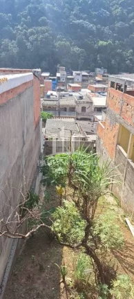 Imagem Terreno 125m² com Salão 43m², Contrato desde o loteador e porão do mesmo tamanho no Jardim Zaíra 4, Mauá-SP