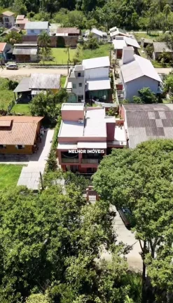 Imagem Casa Duplex á venda com 4 dormitórios localizada na praia Mariscal em Bombinhas.