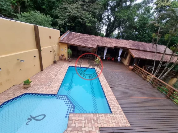 Imagem Casa ampla , estilo colonial ,com 5 suítes , piscina, sauna casa de caseiro , área gourmet , junto a natureza