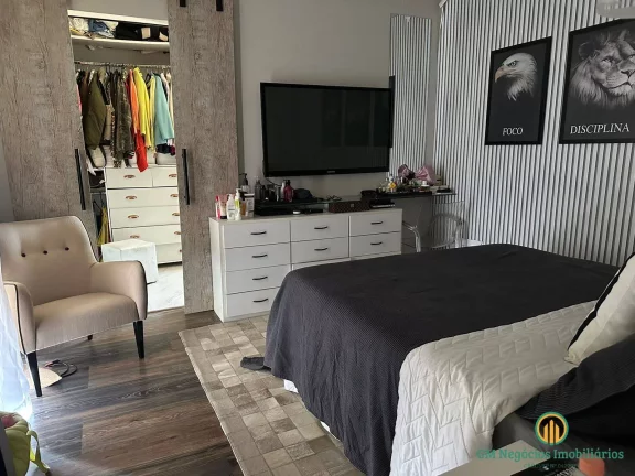 Imagem Linda casa moderna com 3 suítes e área de lazer com piscina em condomínio