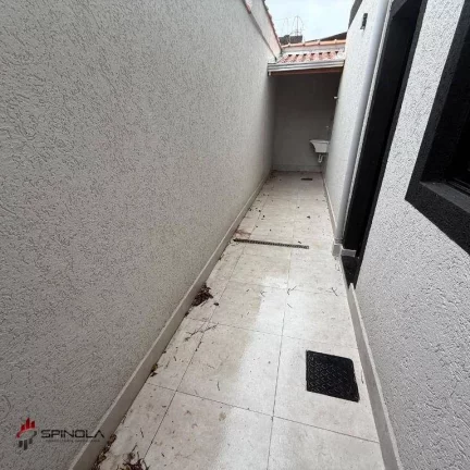 Imagem Sobrado com 2 dormitórios à venda, 54 m² por R$ 345.000 - Maracanã - Praia Grande/SP