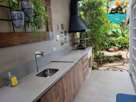 Imagem Casa para locação em condomínio com vista ao mar em Juquehy com 5 suítes, serviço de praia - Acomodação 10-12 pessoas | Juquehy Imobiliária