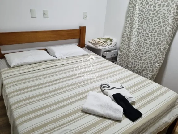Imagem Apartamento com vista para o Tombo e vista para Astúrias com 3 suítes e 2 vagas no Tombo, Guarujá-SP: 214m² de puro requinte!