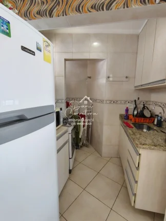 Imagem Apartamento com locação sem garantia frente mar Tombo com lazer: 2 salas, 2 banheiros, 1 vaga de garagem, 78m².