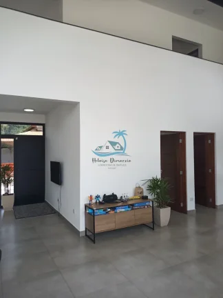 Imagem Casa de alto padrão a venda com 4 dormitórios, 360m² de área construída - Jardim Carolina em Ubatuba.
