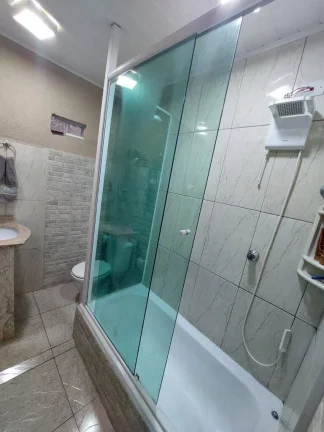Imagem Sobrado com 3 Dormitorios sendo 3 Suites e 2 Vagas de Garagens
