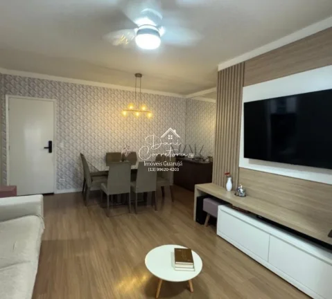 Imagem Aluguel de apartamento no Jardim Astúrias, Guarujá-SP: 2 quartos, 1 suíte, 2 salas, 2 banheiros, 1 vaga de garagem, 85m² de área.