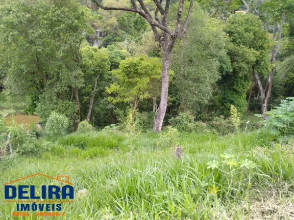 Imagem Chácara em Terra Preta em bairro tranquilo de 1.100m² à venda.