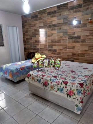 Imagem CASA À VENDA COM 3 SUÍTES ITANHAÉM