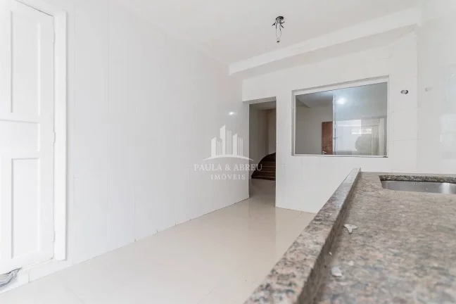 Imagem Casa com Terreno de 70m² e 101m²de área útil São 3 Dormitórios, 2 Banheiros, Sacada, 2 Vagas, Quintal no Bairro Casa Branca, Santo André