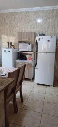 Imagem Casa com 3 dormitórios à venda, 114 m² por R$ 495.000,00 - Maracanã - Praia Grande/SP