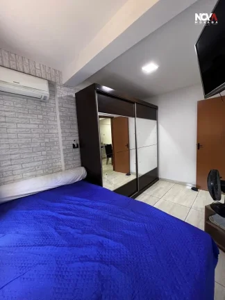 Imagem Descubra este aconchegante apartamento à venda no Edifício Santos 3, localizado no bairro Nova Ita...