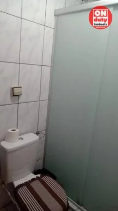 Imagem Apartamento com 2 dormitórios à venda, 64 m² por R$ 220.000,00 - Saboó - Santos/SP