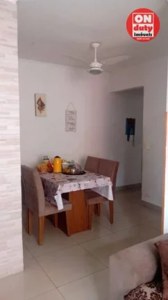 Imagem Apartamento com 2 dormitórios à venda, 64 m² por R$ 220.000,00 - Saboó - Santos/SP