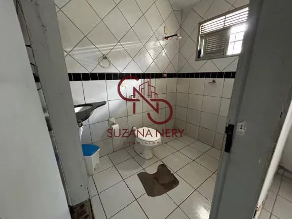 Imagem Prédio comercial com uma casa, 2 lojas e 11 kitinets