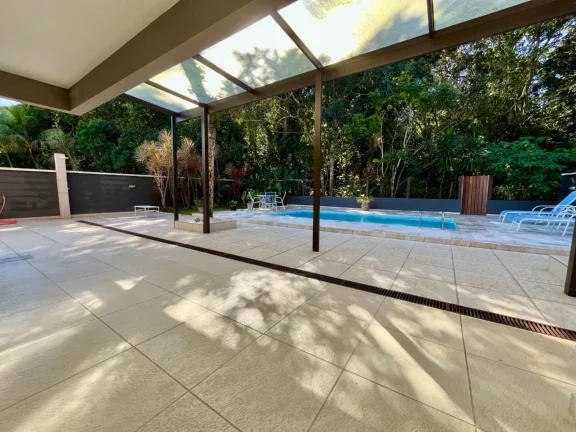 Imagem Casa de Luxo na Riviera de São Lourenço Módulo 26: 3 Quartos, 1 Suíte, Varanda Gourmet, Piscina e Muito Mais!