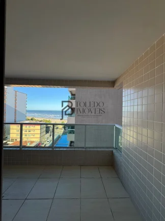 Imagem Apartamento de 2 dormitórios sendo 1 suíte, prédio frente mar no bairro Vila Mirim - Praia Grande