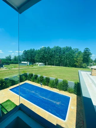 Imagem Belíssima casa a venda no Condomínio Ninho Verde I Eco Residence - Quadra/SP.