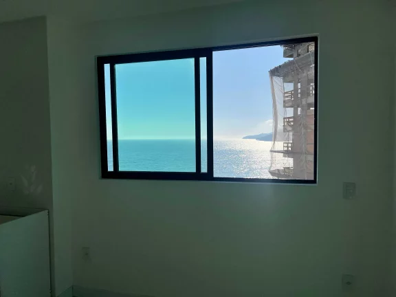 Imagem Apartamento vista mar com 3 suítes e 2 vagas de garagem em Balneário Perequê - SC