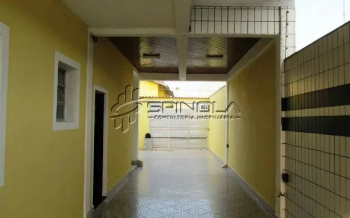 Imagem Casa com 3 dormitórios à venda, 190 m² por R$ 850.000 - Vila Tupi - Praia Grande/SP