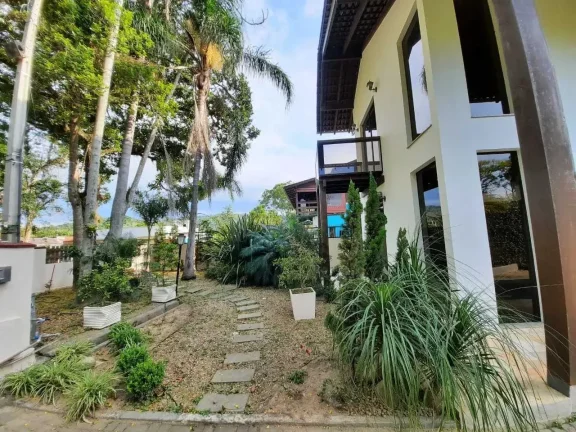 Imagem Casa de alto padrão mobiliada com 3 dormitórios sendo 1 suíte e 5 vagas de garagem em Penha