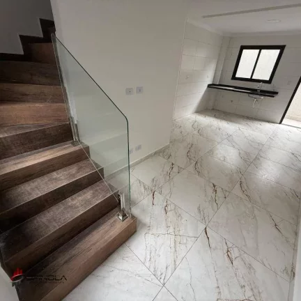 Imagem Sobrado com 2 dormitórios à venda, 54 m² por R$ 345.000 - Maracanã - Praia Grande/SP