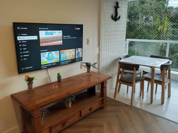 Imagem APARTAMENTO PRAIA DA ENSEADA com 2 dormitórios sendo 1 suíte,1 vaga de garagem,varanda gourmet com churrasqueira