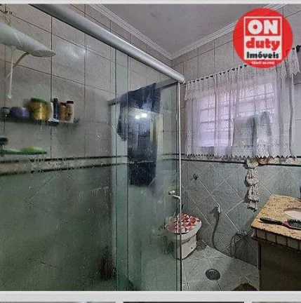 Imagem Casa com 3 dormitórios à venda, 275 m² por R$ 610.000,00 - Bom Retiro - Santos/SP