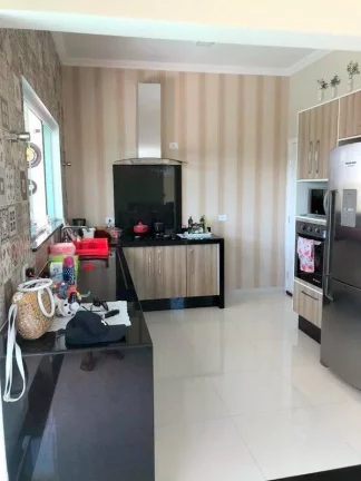 Imagem BELISSIMO SOBRADO EM CONDOMINIO FECHADO COM 5 SUITES