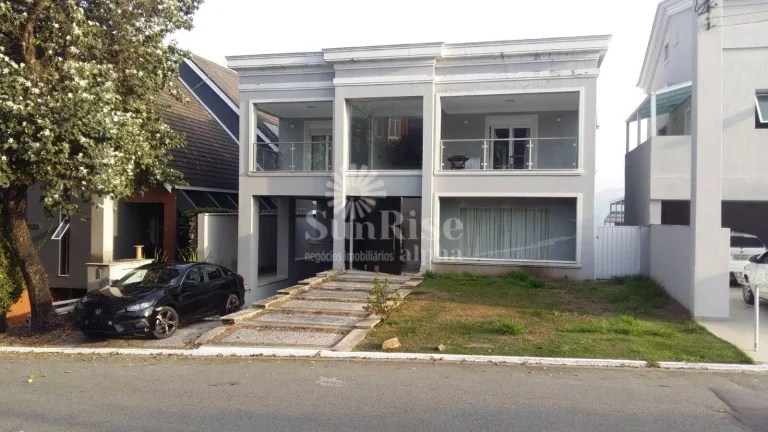 Imagem Casa em condomínio com 695 m² de área construída e 420 m² de terreno, 4 suítes, com garagem para 5 veículos,Alphaville 10-SP