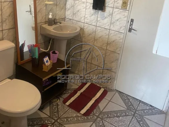 Imagem Espaçosa Casa Geminada à Venda no Tupiry, Praia Grande - 3 Quartos