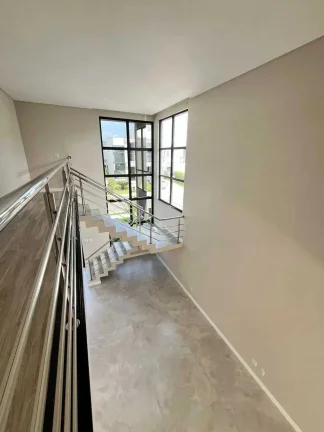 Imagem Casa de alto padrão com 4 dormitórios sendo 3 suítes e 4 vagas de garagem em Camboriú/SC