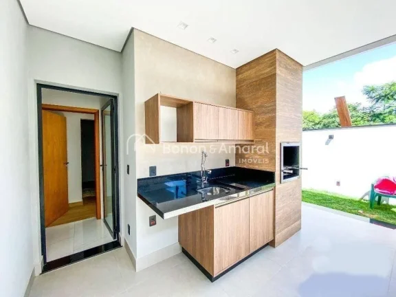 Imagem Casa térrea com 3 suítes, cozinha americana integrada às salas de estar e jantar, e área gourmet...