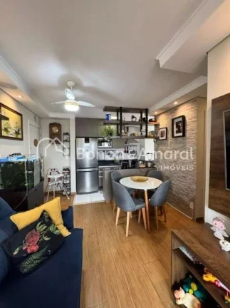 Imagem O imóvel conta com um living acolhedor para dois ambientes, ideal para receber amigos e familiares ...