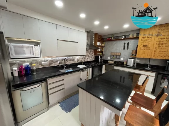 Imagem Casa em Juquehy para alugar - condomínio fechado com 5 suítes, 3 vagas, 100m da praia - Acomodação máx. 12 pessoas | Juquehy Imobiliária.