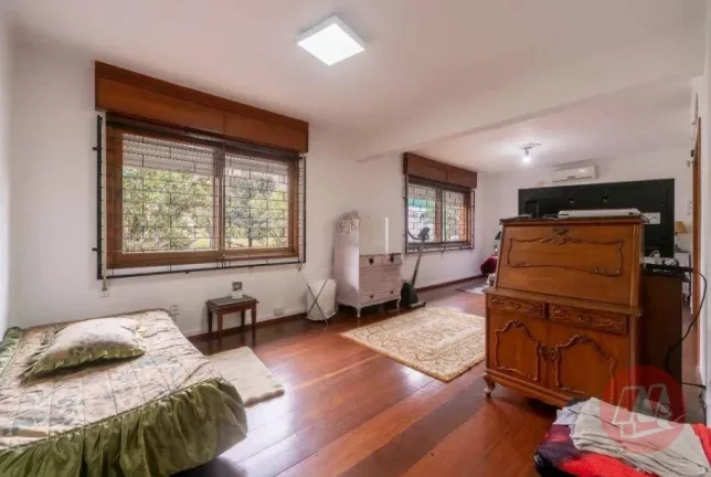 Imagem Casa com 3 dormitórios, 299 m² - venda por R$ 2.385.000,00 ou aluguel por R$ 23.499,00/mês - Boa Vista - Porto Alegre/RS