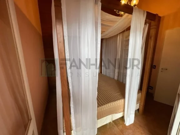 Imagem Deslumbre-se com esta incrível oportunidade de adquirir uma casa dos sonhos no exclusivo condomínio Yacamim, localizado em Ilhabela. Com uma vista esp