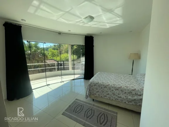 Imagem "Residência Exclusiva no Condomínio Flamboyant, Atibaia: 5 Suítes, Vista Deslumbrante e Oportunidade de Permuta!"