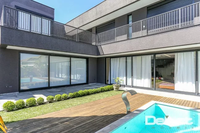 Imagem Residência Alto Padrão - 5 Suítes, Piscina e ELEVADOR no Alphaville Graciosa – 500m² de Sofisticação… Um verdadeiro espetáculo!!!