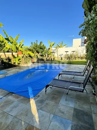 Imagem Casa à venda, no Brisas do Rio com Três quartos, piscina, jardim, muito verde